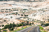 Steep dramatic highway 12 scenic byway with winding road in Calf Creek Recreational Area and Grand Staircase Escalante National Monument in Utah