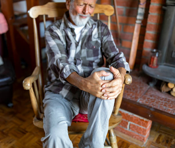 istock Senior man with chronic knee problems and pain 1177903503