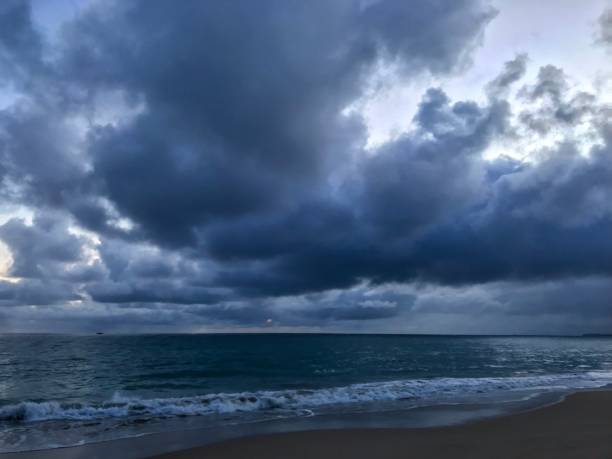 istock Beautiful dramatic clouds over a Puerto Rican beach at dusk 1177903827
