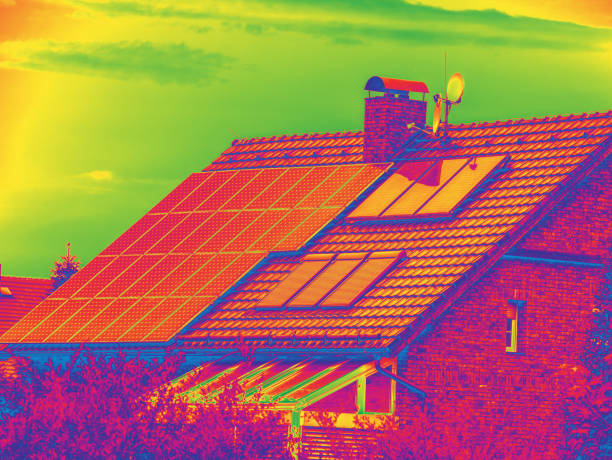 Thermal insulation from house with  photovoltaic solar panels stock photo