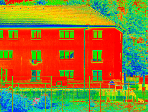 istock Infrared thermo vision shows thermal radiation from house 1177904674
