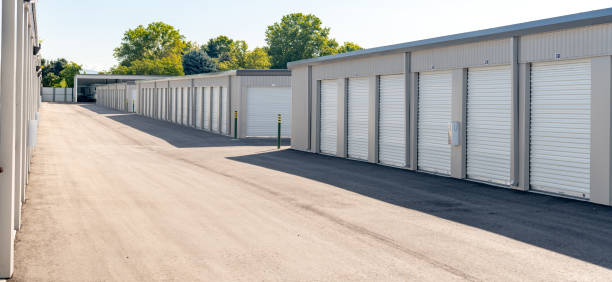 istock Mini garages of a storage unit facility with trees 1177905044