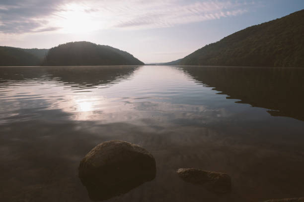 istock Beautiful peaceful lake landscape at sunrise 1177910523