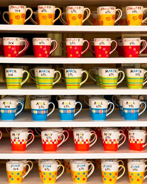 istock mugs or cups on the shelf 1177913370