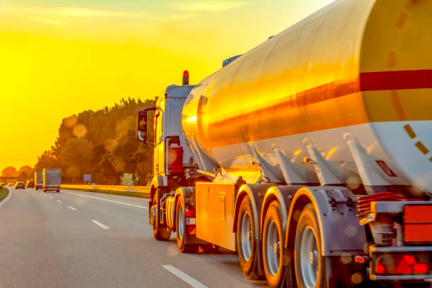 istock Tanker with chrome tanker on the highway. Working visit 1177913742