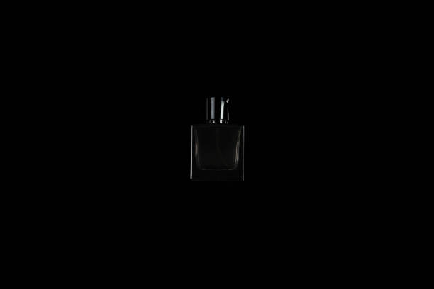 istock small dark perfume bottle on black isolated background 1177916127