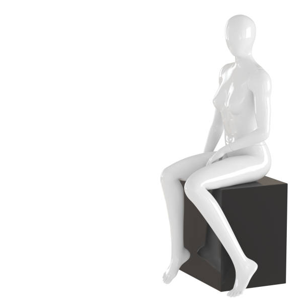 istock A white female mannequin sits on a black box on an isolated white background. 3D rendering 1177917453