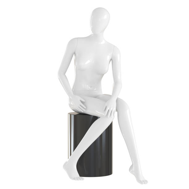 istock A white female mannequin sits on a black box on an isolated white background. 3D rendering 1177917459