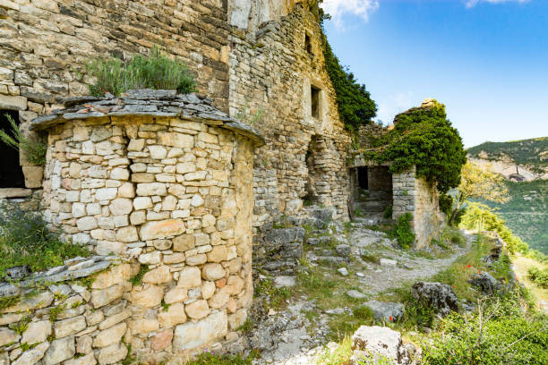 The ruins of the troglodyte village of Eglazine in the Gorges du Tarn, France