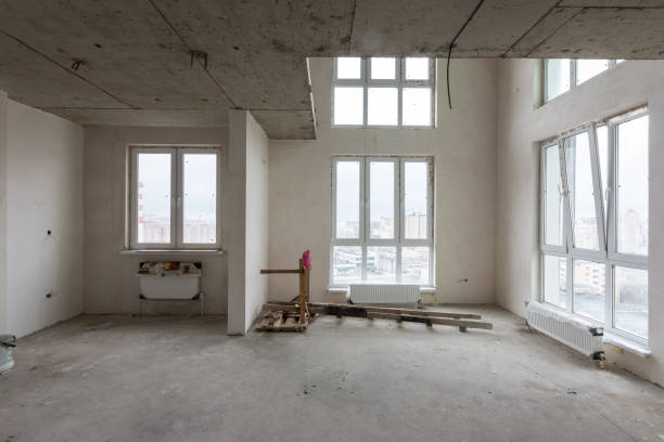 istock Spacious living room in a new building, with stained-glass windows and a second light 1177928264