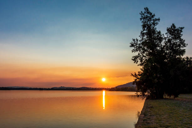 istock A calm lake displaying late afternoon colors 1177929307