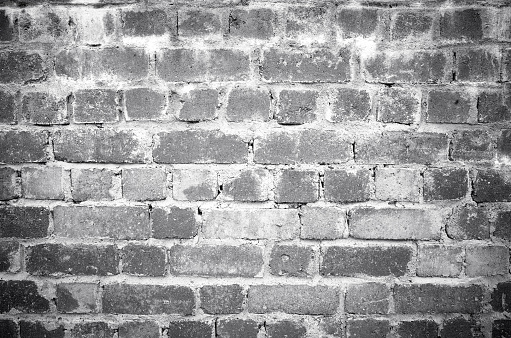 Old dark gray brick wall texture background
