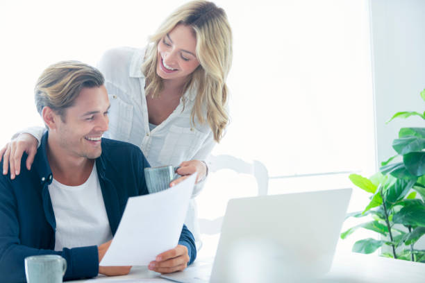istock Young Couple working on their home finances and other paperwork. 1177934283