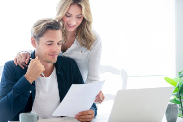 istock Young Couple working on their home finances and other paperwork. 1177934292