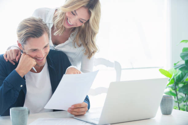istock Young Couple working on their home finances and other paperwork. 1177934297