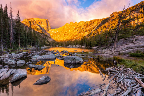 istock Golden Dream Lake Outlet Sunrise 1177941861