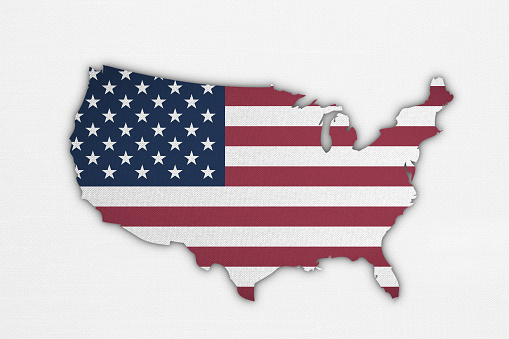 Flag of the United States on a stained tin background