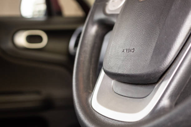 istock Safety airbag sign on car steering wheel 1177942832