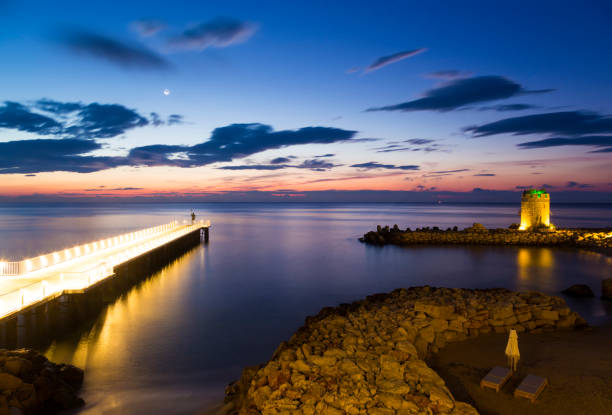 istock Sunrise by the sea 1177944620