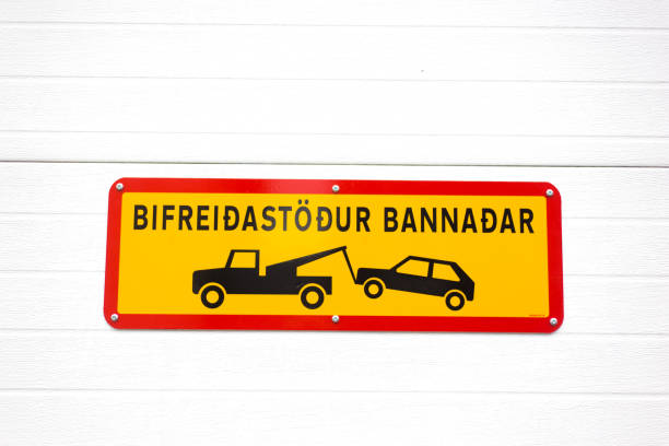 istock Iceland Sign: Yellow Tow-Away Zone Sign on White Background 1177944642