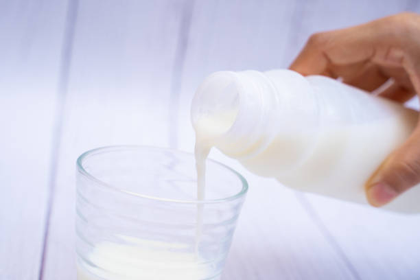 istock pouring fresh milk into glass 1177967579