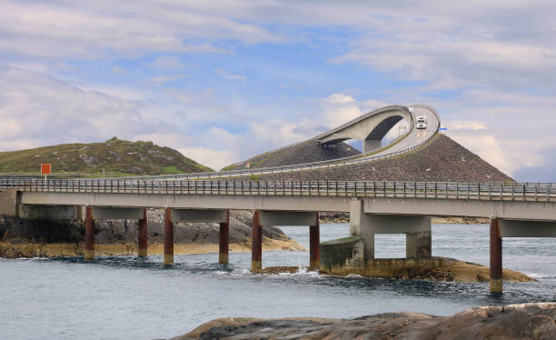 Homecar passing on Storseisundet Bridge, Atlantic Road in Norway