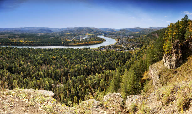 River, rock and autumn forest. View from above.