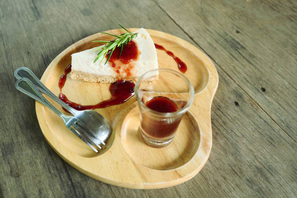 istock Cheesecake pie slice topped with strawberry syrup 1177973779
