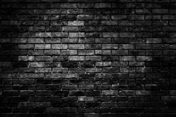 istock Abstract image of Rustic black grunge brick wall texture background. 1177974602
