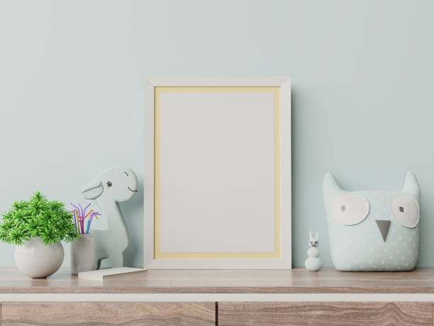 istock Mock up posters in child room interior, posters on empty blue wall background. 1177974644