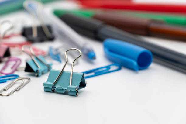 istock Colorful office tools set, pen, binder, paper clip, pencils, eraser on white background 1177986601