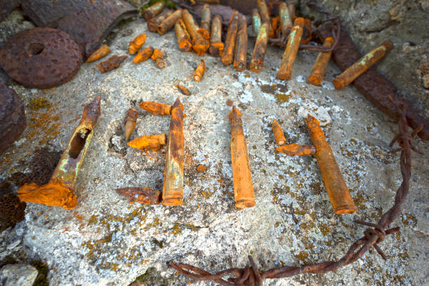 Rusty fragments, bullets in a dugout