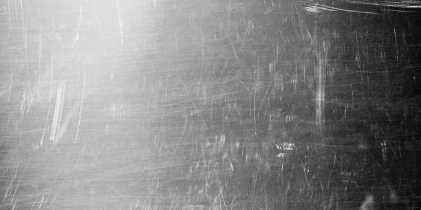 istock Scratches on polished shiny metal. Abstract industrial texture background 1177995186