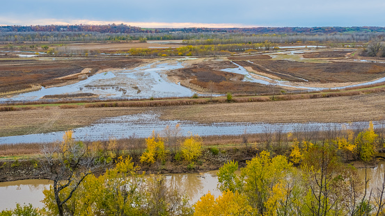 Aerial view of Missouri River floodplain with standing water in plowed fields; fall in Missouri, Midwest