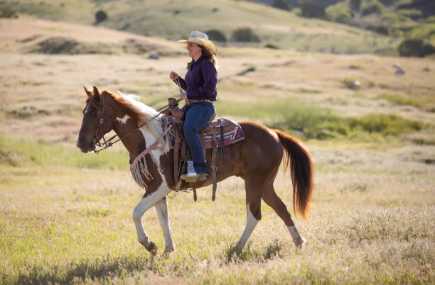 istock Cowgirl Horseback Riding 1178002540