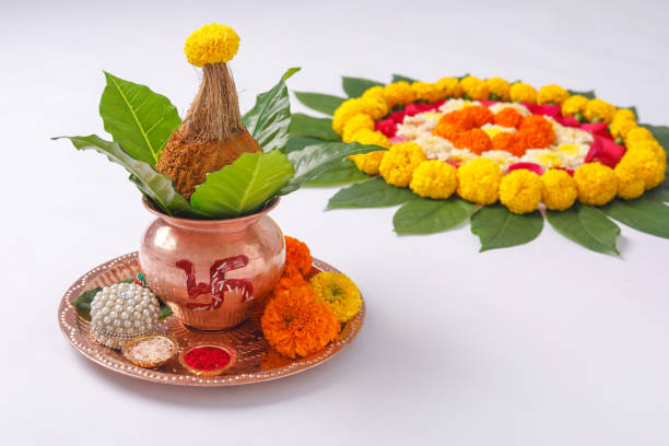 istock Copper Kalash with coconut , leaf and floral decoration on a white background. essential in hindu puja. 1178003653
