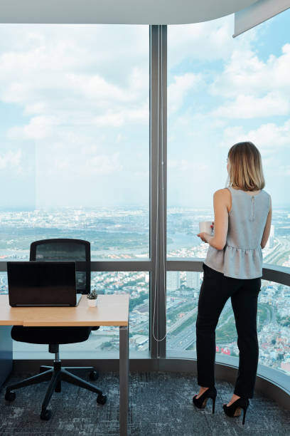 istock Ambitious businesswoman drinking morning coffee 1178004521