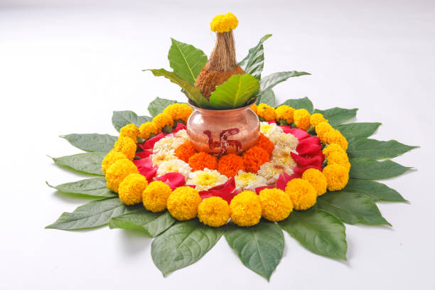 istock Copper Kalash with coconut , leaf and floral decoration on a white background. essential in hindu puja. 1178004746