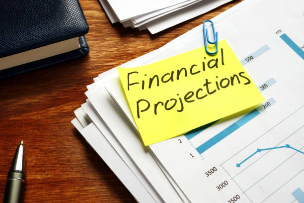 istock Financial Projections label on a pile of business documents. 1178006945