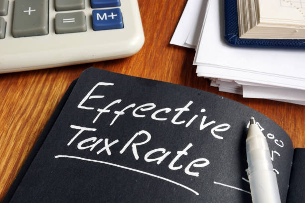 istock Effective Tax Rate concept. Stack of papers on a desk. 1178007023
