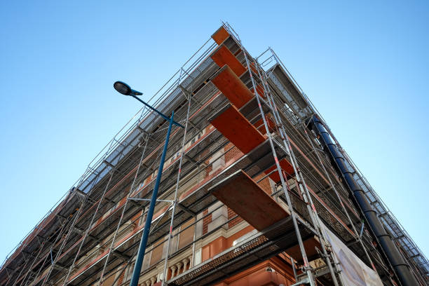 istock View of scaffolding around historical brick building 1178007066