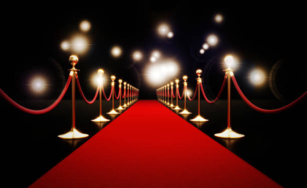 alfombra roja y luces paparazzi sobre fondo negro - estreno de película fotografías e imágenes de stock