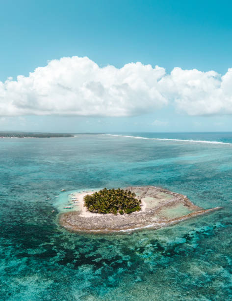 istock Small island in the Philippines with a white sand beach and palm trees 1178010422