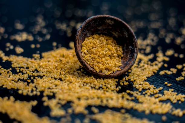 istock Raw oats in a black colored clay bowl on the black surface. 1178012877