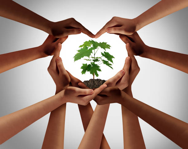 Earthday Earth Day Earthday or earth day as group of diverse people joining to form heart hands connected together protecting the environment and promoting conservation and climate change issues as an image composite. deforestation photos stock pictures, royalty-free photos & images