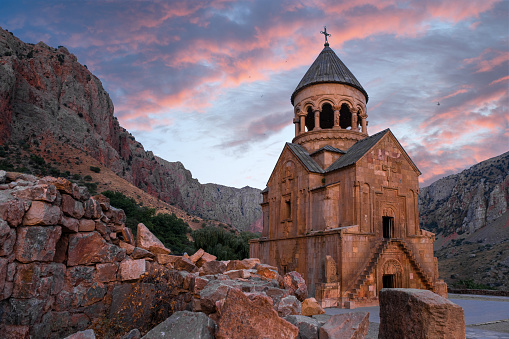 the Armenian monastery of Noravank in the evening with a troubled sky