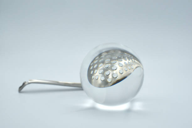 istock absynthe spoon glass ball 1178015715