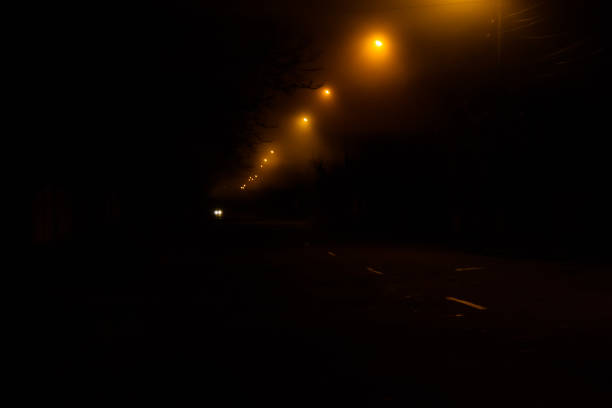 istock Old street at night illuminated by the lanterns 1178018017
