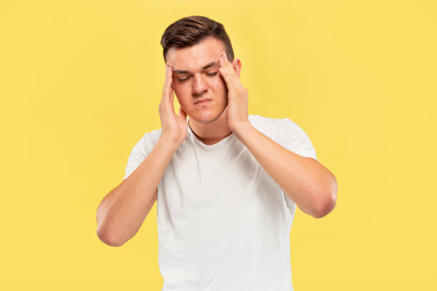 istock Caucasian young man's half-length portrait on yellow background 1178020780