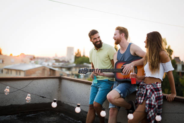 istock Group of carefree friends dancing have fun in summer 1178024606